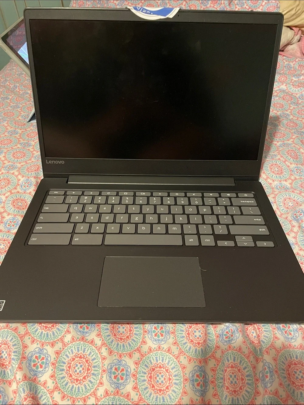 Black Laptop with Colorful Sticker Design - stickers can be removed